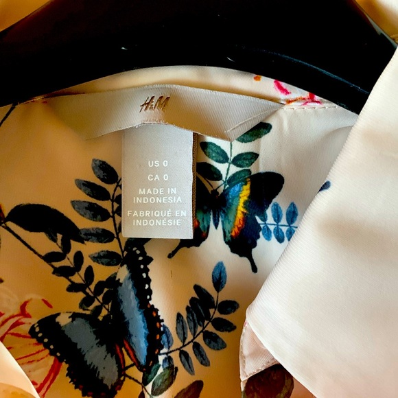 H&M shirt, polyester, owned. Butterfly print. Predominately colour beige. - Picture 1 of 5